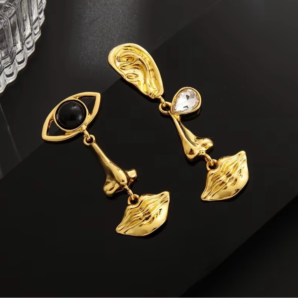 Schiaparelli Inspired Gold and Black Asymmetrical Earrings
